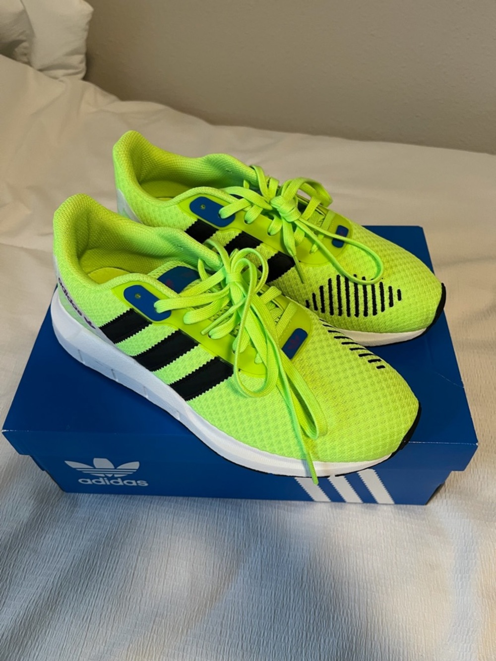 adidas women’s Neon Lime Athletic Sneakers with Black Stripes